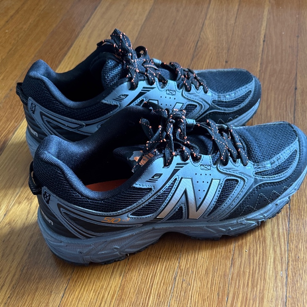 New Balance all terrain Men's Black and Silver Athletic Shoes